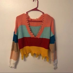 Distressed color block sweater